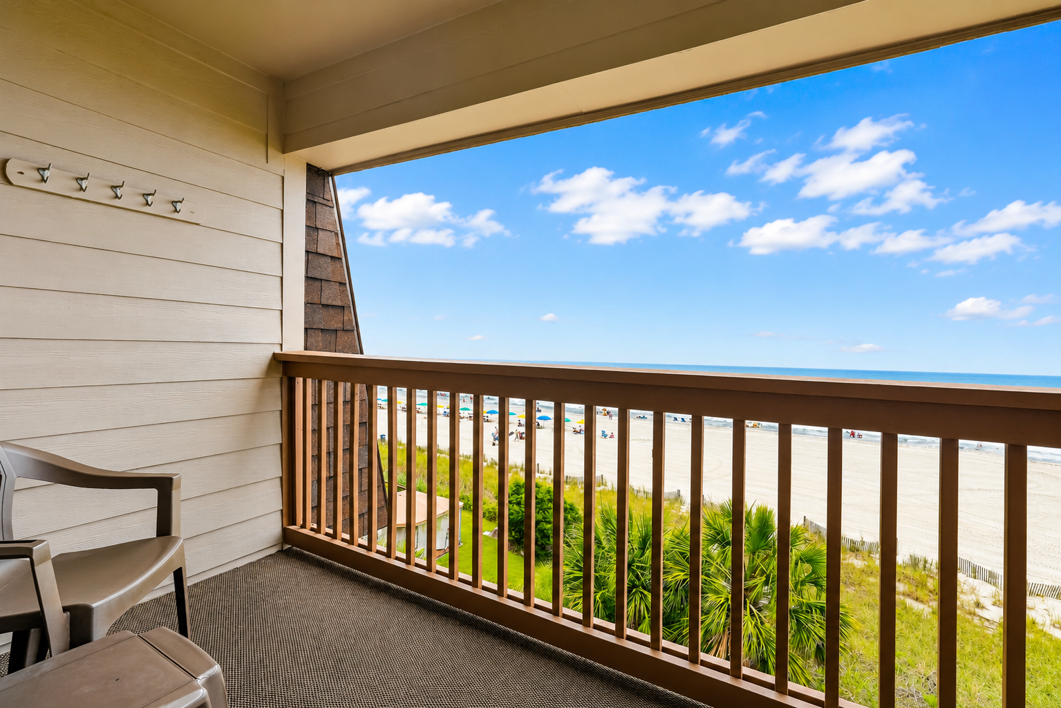 A balcony with a beach view